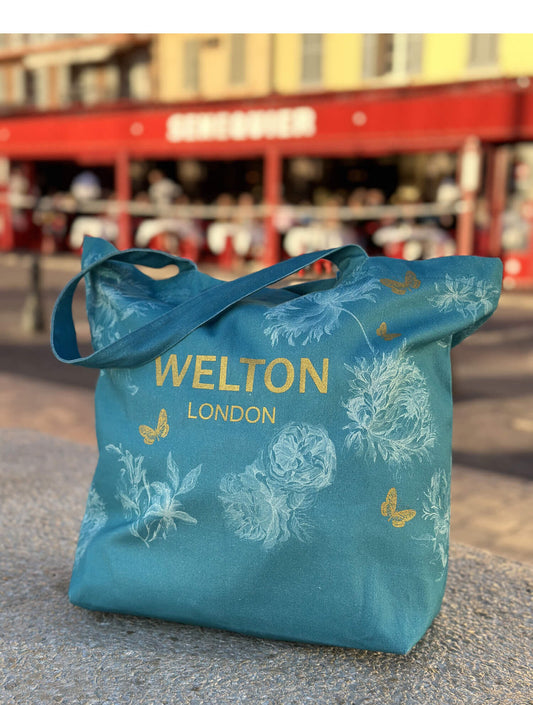 Large turquoise teal cotton tote bag with gold accents and WELTON logo, ideal for summer outings and chich outings